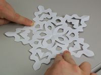 ¿Cómo hacer un copo de nieve de papel de cinco puntas